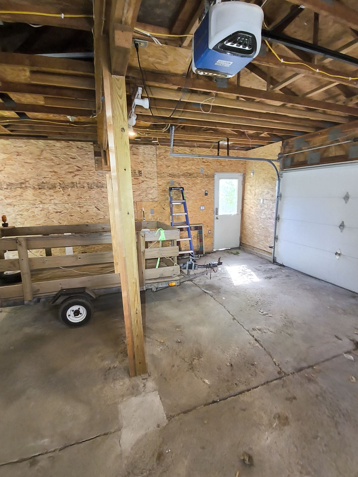 Detached garage interior with exposed framing inspected near Madison, WI