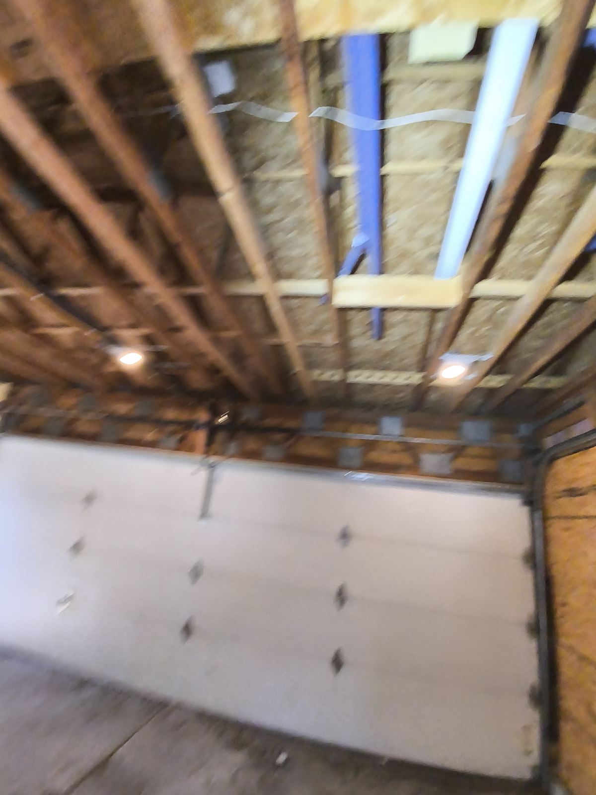 Exposed roof framing and sheathing checked as part of a Dane County home inspection